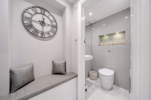 Cloakroom and seating area- click for photo gallery
